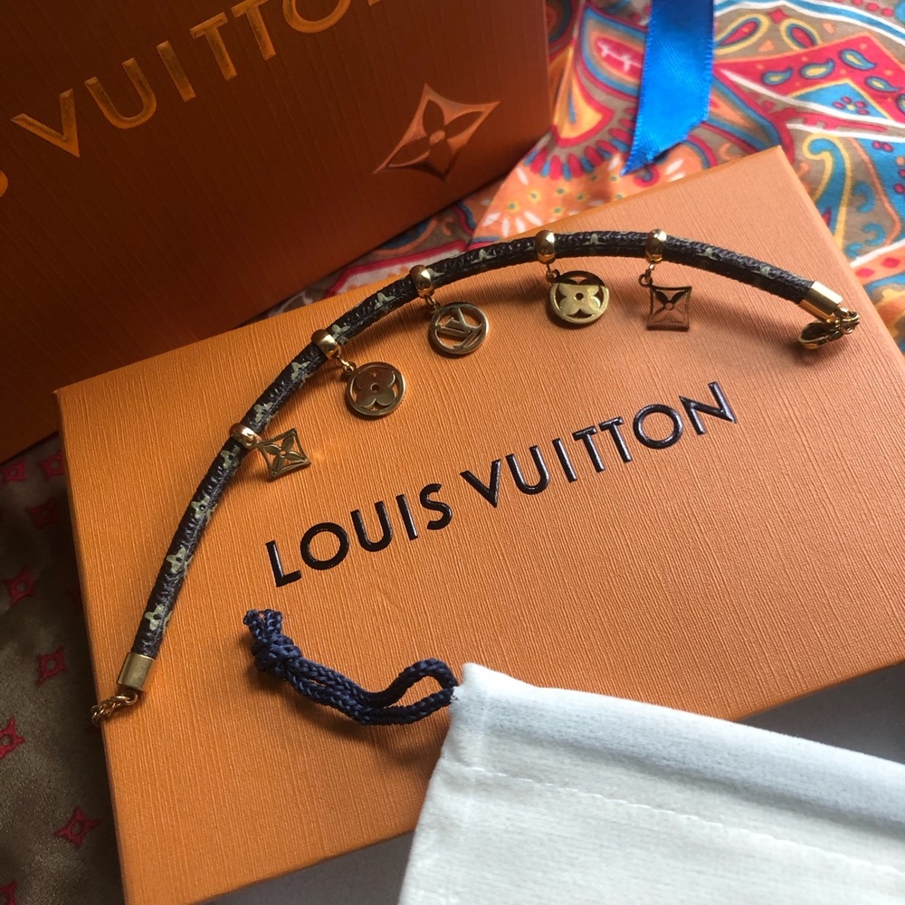 Louis Vuitton Charm Bracelet Brown Mono with goldtone hardware and charms NWOT